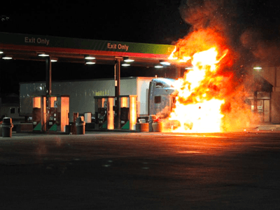 semi on fire-at-gas-station