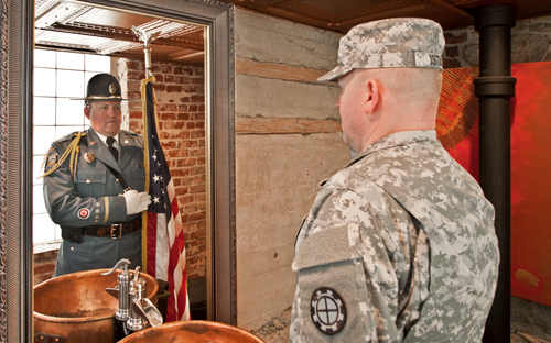 Man in Army uniform sees himself in KHP honor guard uniform in mirror