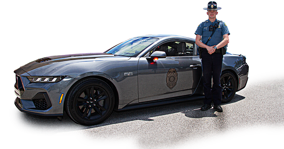 trooper standing next to Ford Mustang patrol car